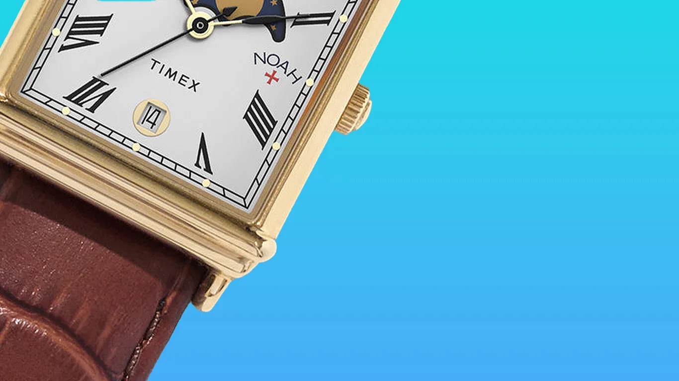 closeup of a timex x noah moonphase cartier tank style dress watch
