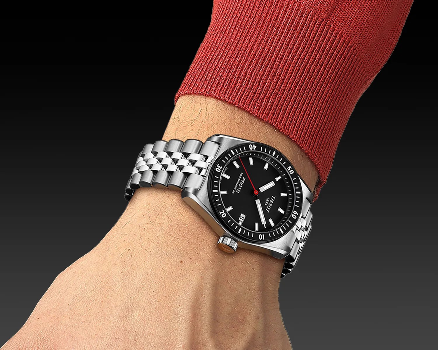 a tissot pr516 watch on a mans wrist