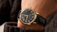 a todd snyder x timex watch on a mans wrist