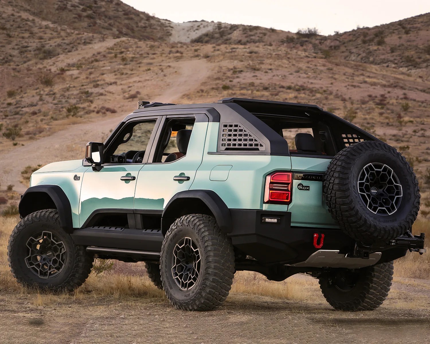 the rear view of the toyota land cruiser rox concept suv