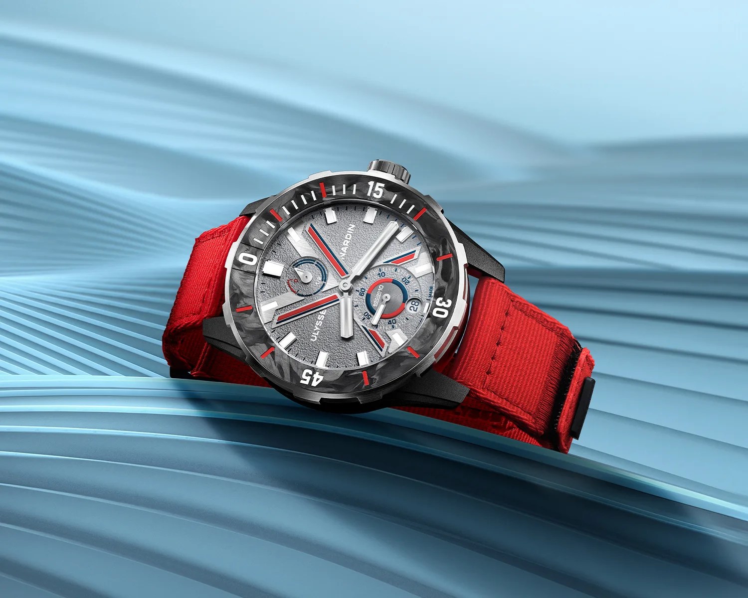 a ulysse nardin Diver NET Vendée Globe dive watch on a blue wavy surface