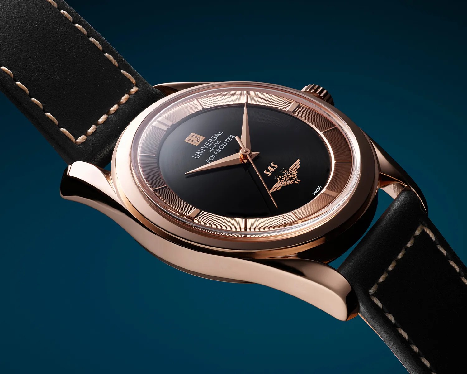 a gold universal geneve polerouter watch