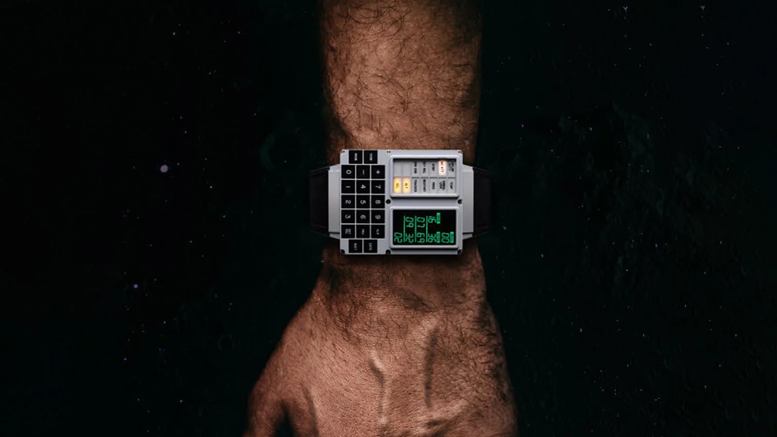 A male wrist wearing the Apollo Instruments DSKY Moonswatch on his wrist pointing straight down. The wrist wearing the watch is shown on top of a black background speckled with stars