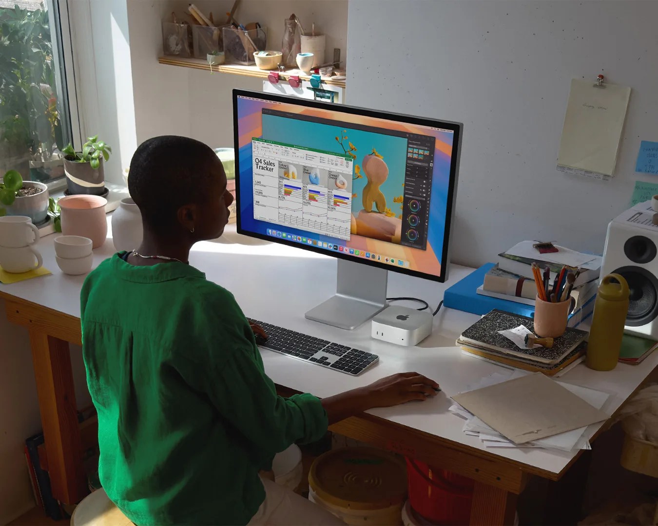 man using computer with Apple Mac Mini (M4)