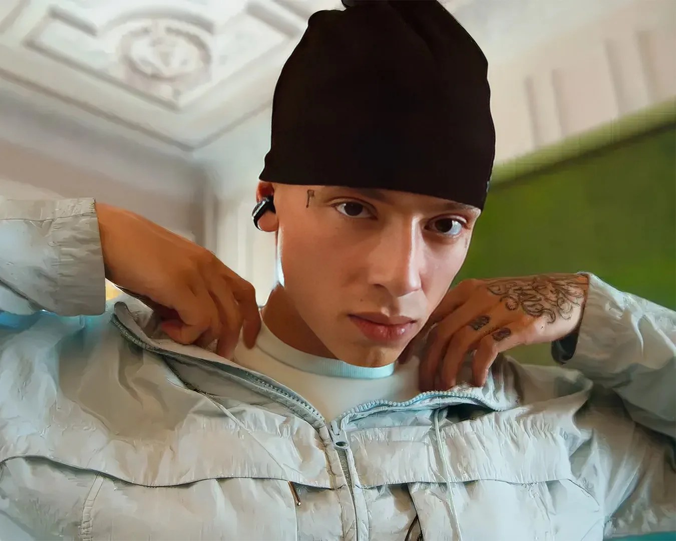 man wearing Bose Ultra Open Earbuds