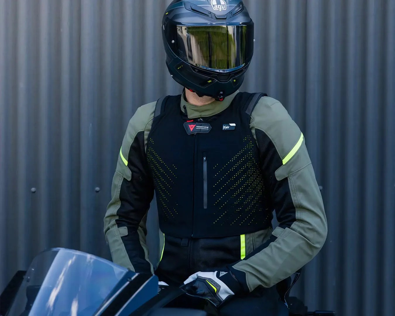 person sitting on motorcycle wearing Dainese Smart Air