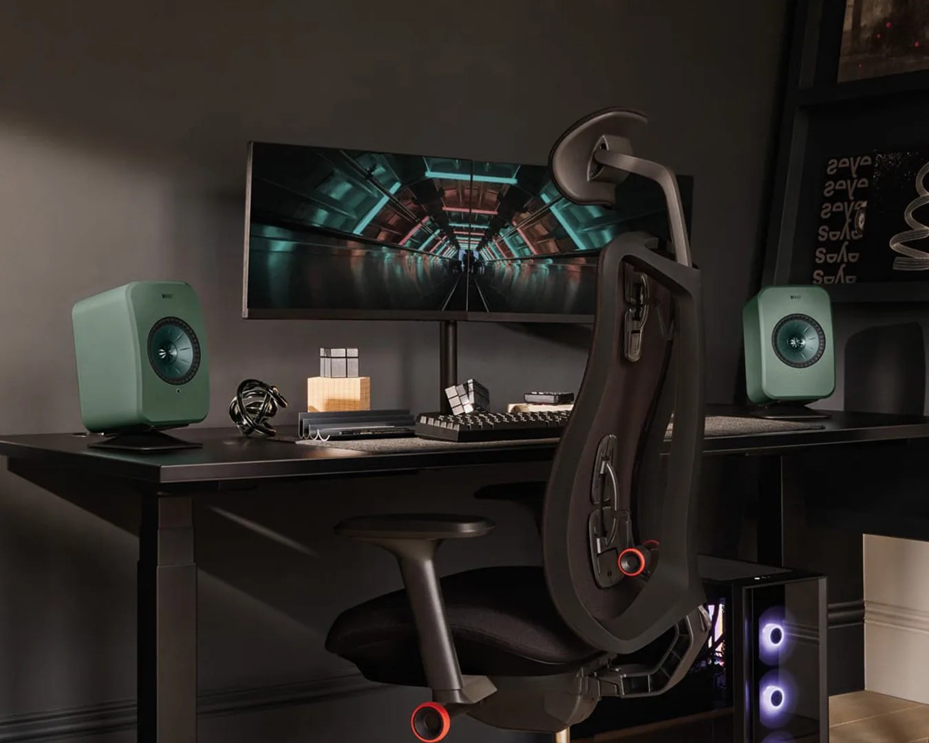 two green KEF LSX II LT on desk with computer set up