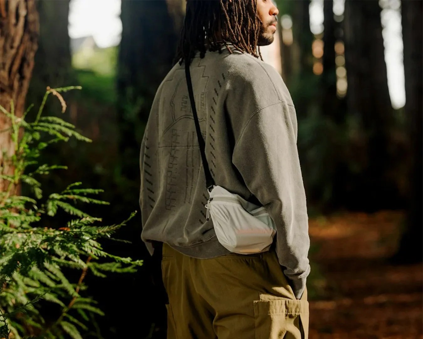 man wearing Peak Design Ultralight Packing Cube