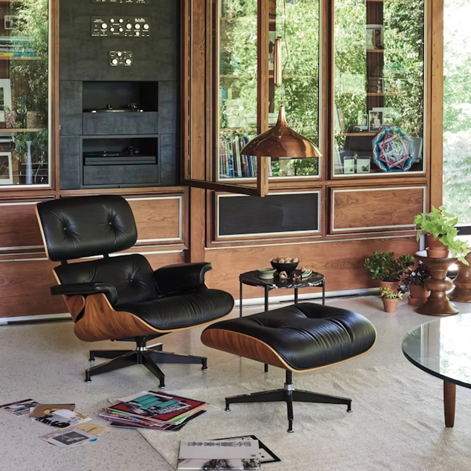The Eames Lounge Chair and Ottoman in a living room.