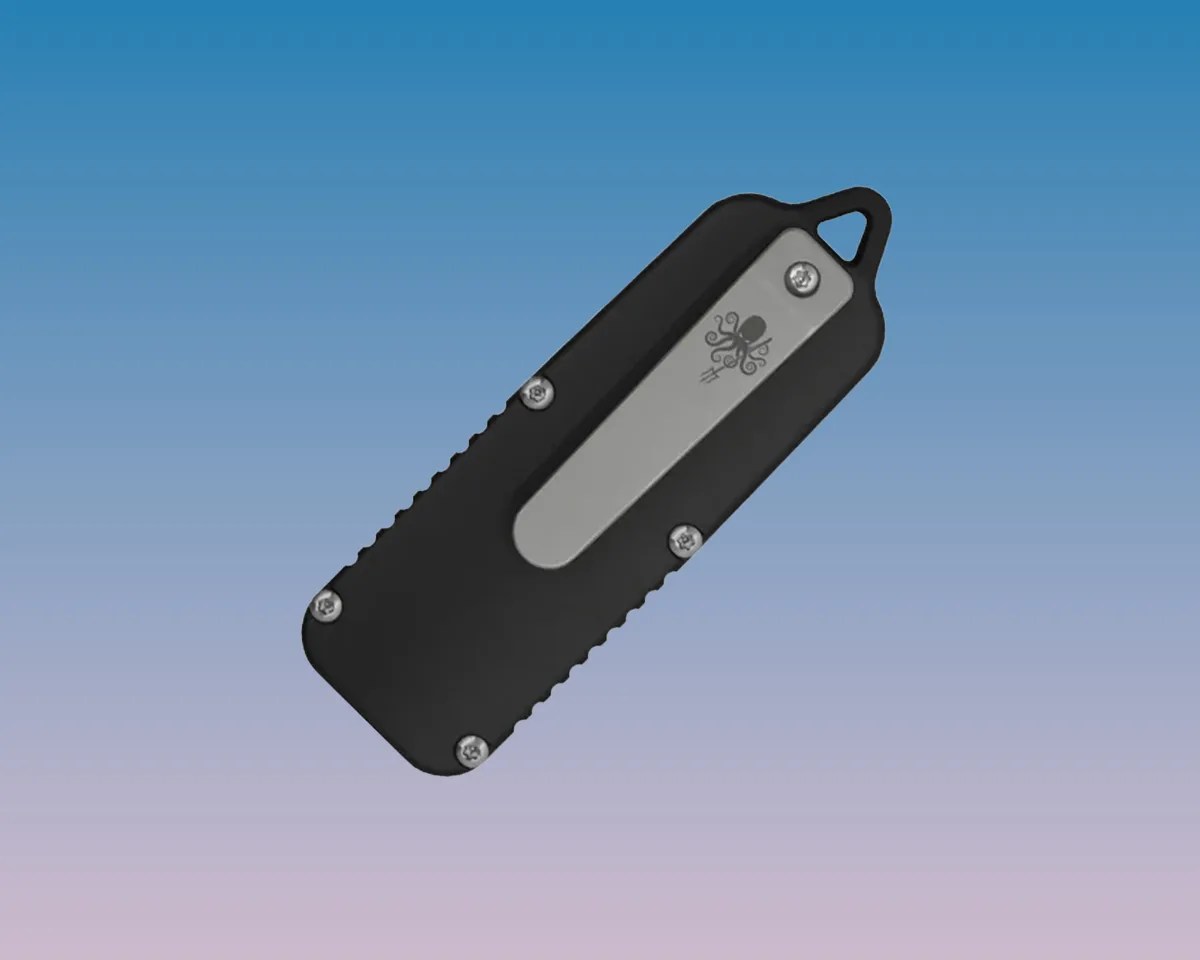 Terrain 365 x Prometheus Design Werx CAS OTF knife handle on blue-pink gradient background