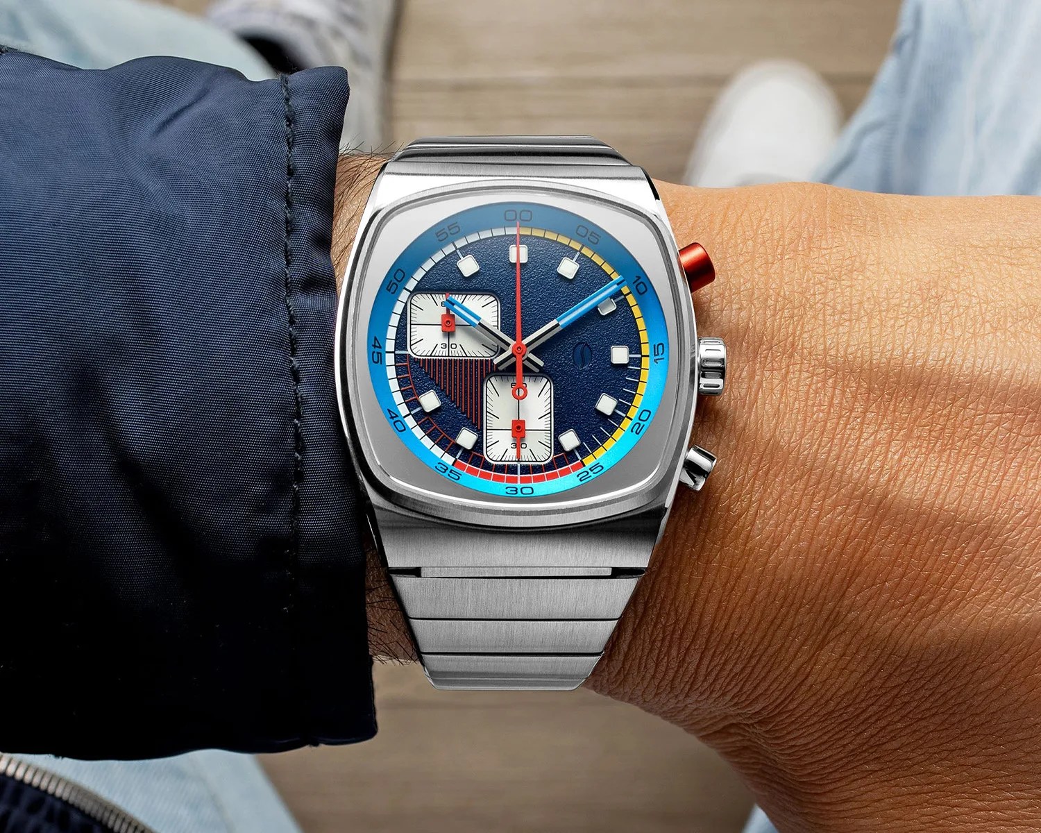 a brew watch on a mans wrist