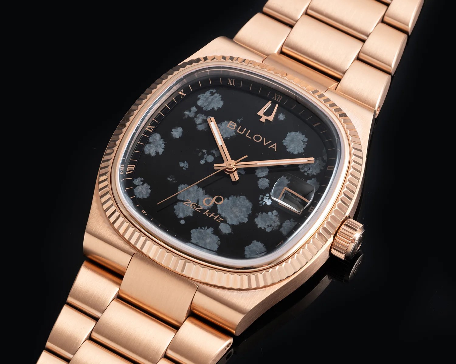 a bulova watch with a stone dial