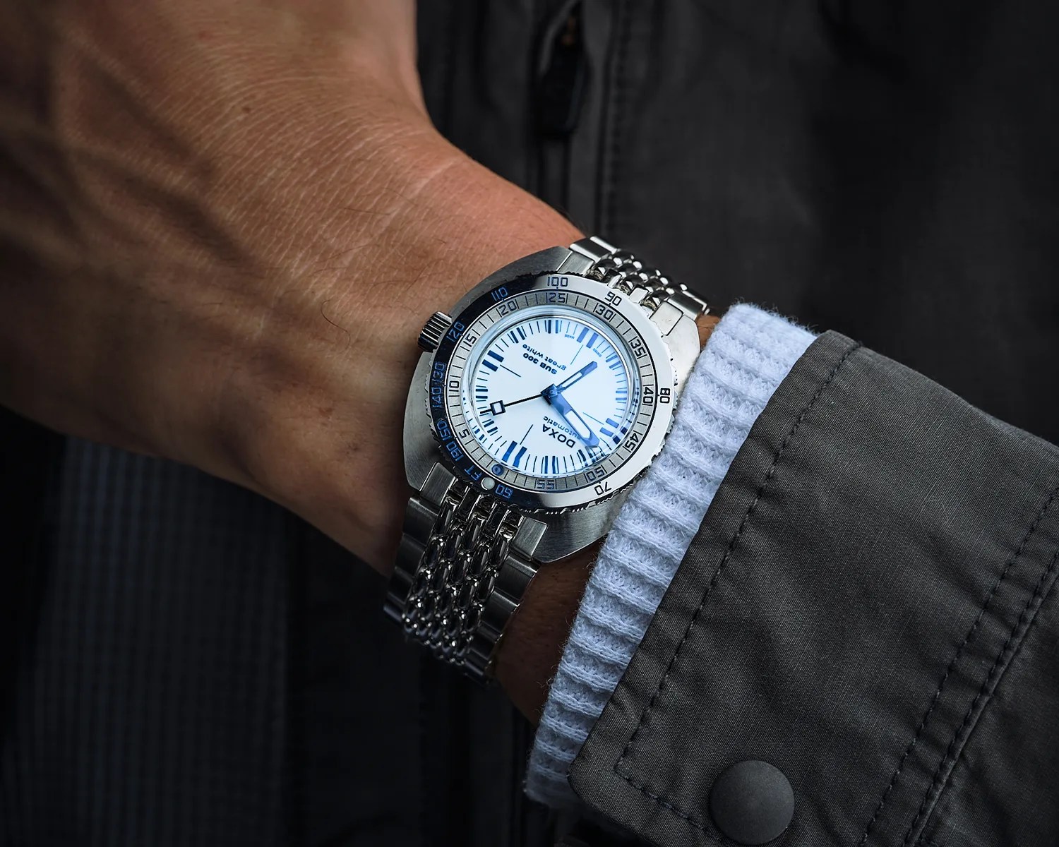 a doxa dive watch on a mans wrist