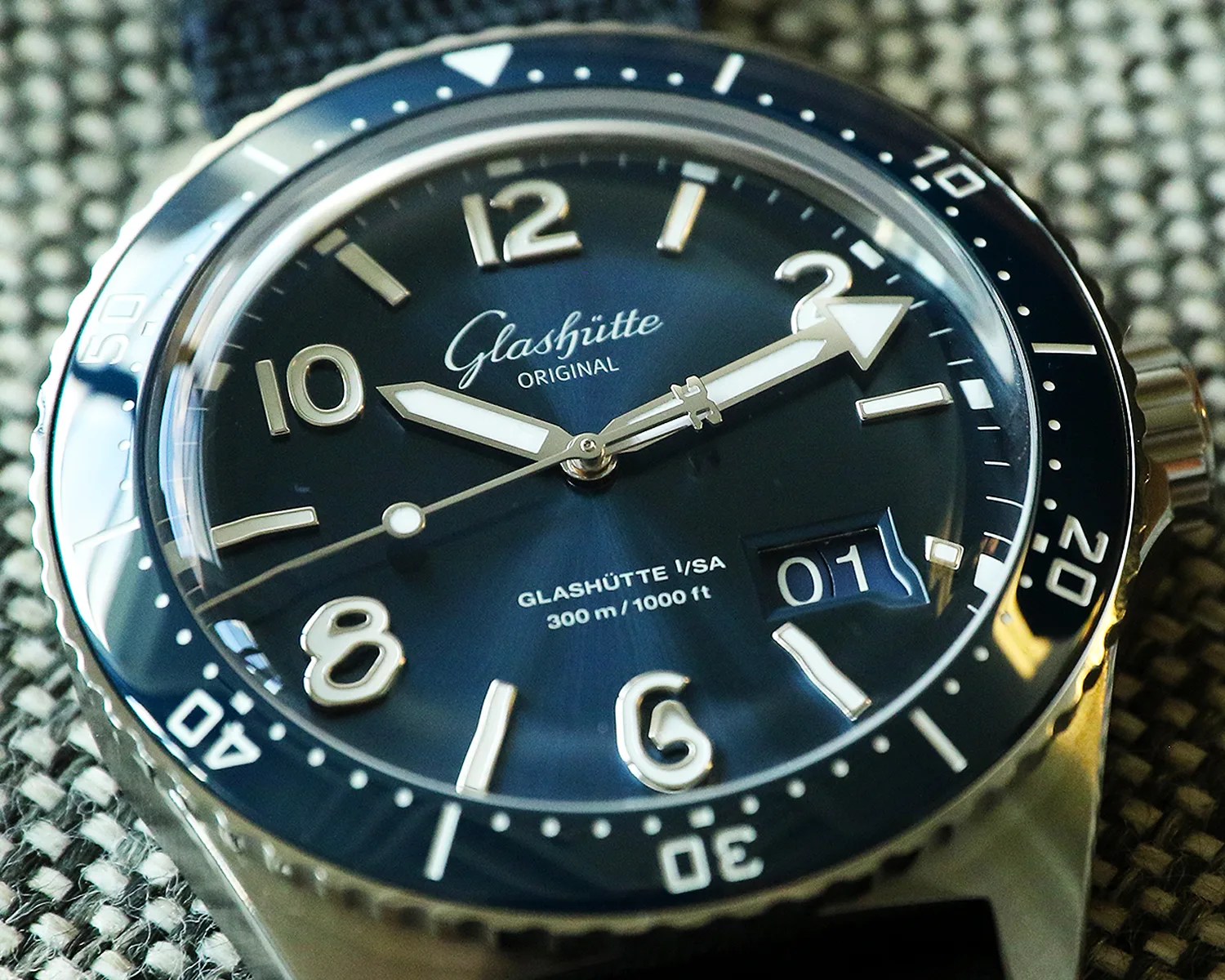 a closeup of the dial on a a glashutte original dive watch