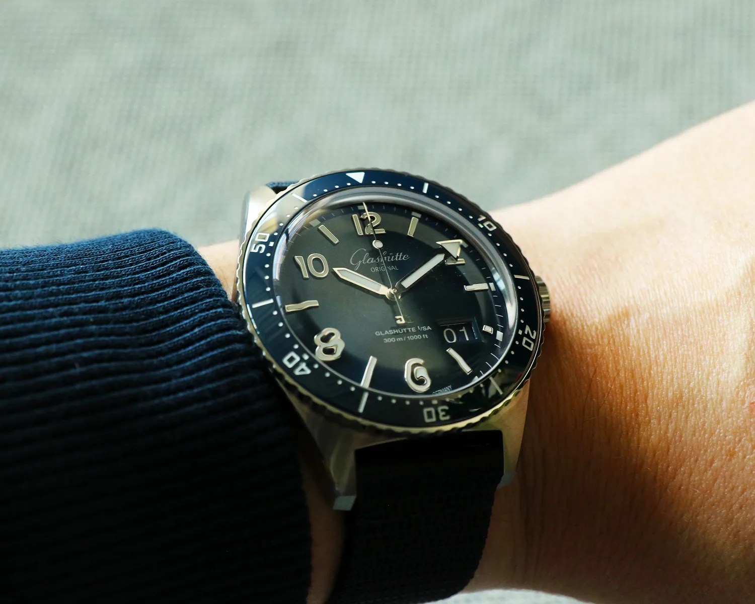 a glashutte original dive watch on a mans wrist