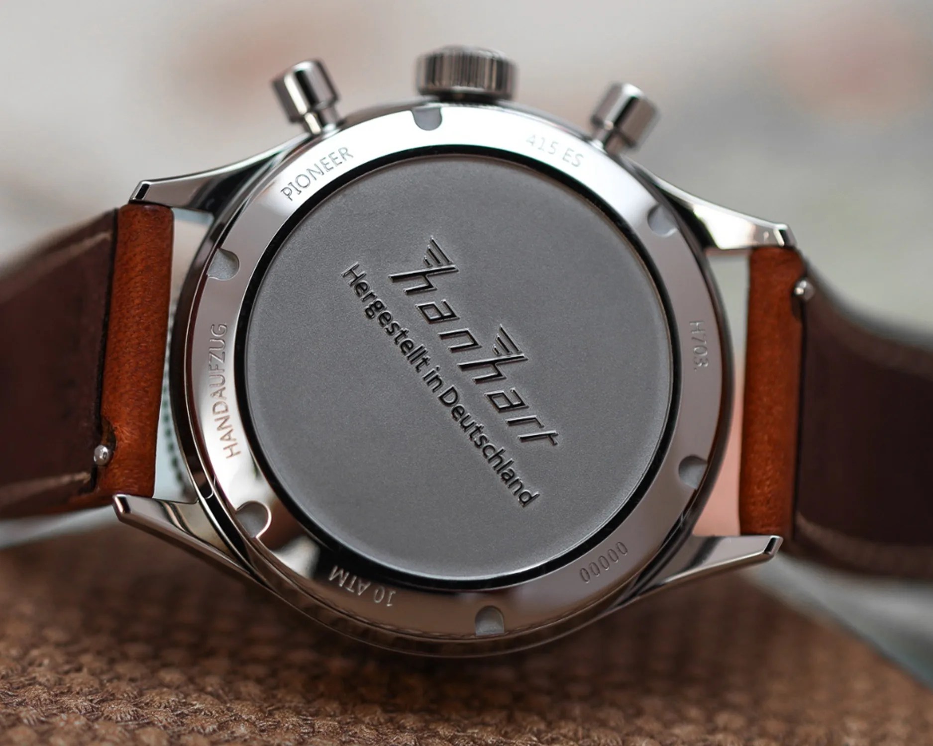 the caseback of a hanhart watch