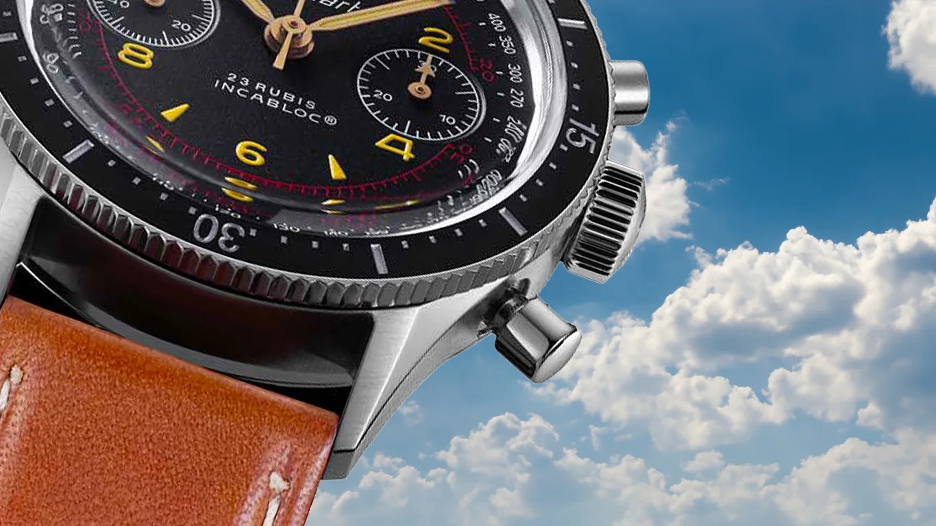 a closeup of a hanhart pilot watch in the sky