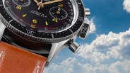 a closeup of a hanhart pilot watch in the sky