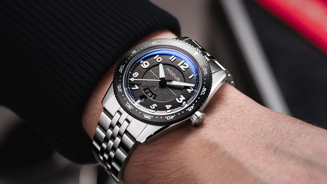 a nodus pilot watch on a mans wrist