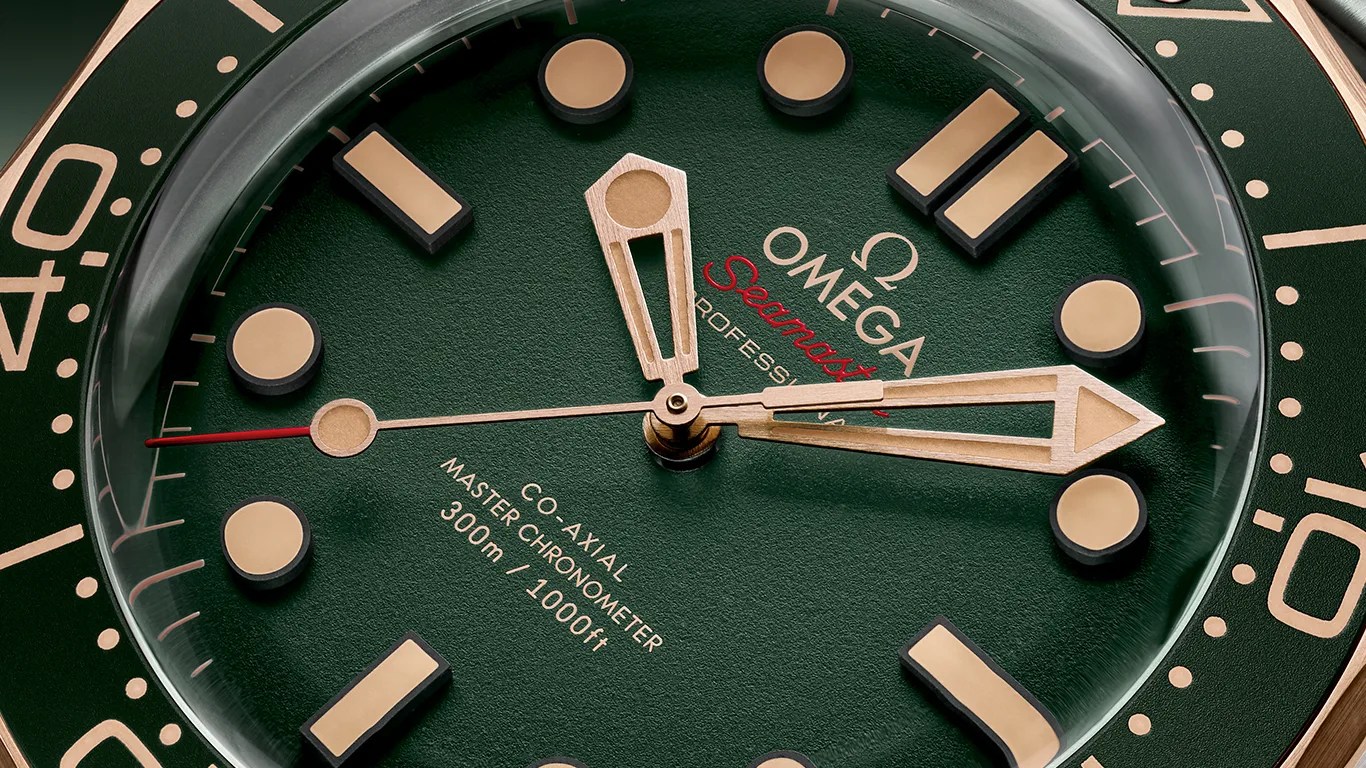 a closeup of an omega seamaster dive watch dial