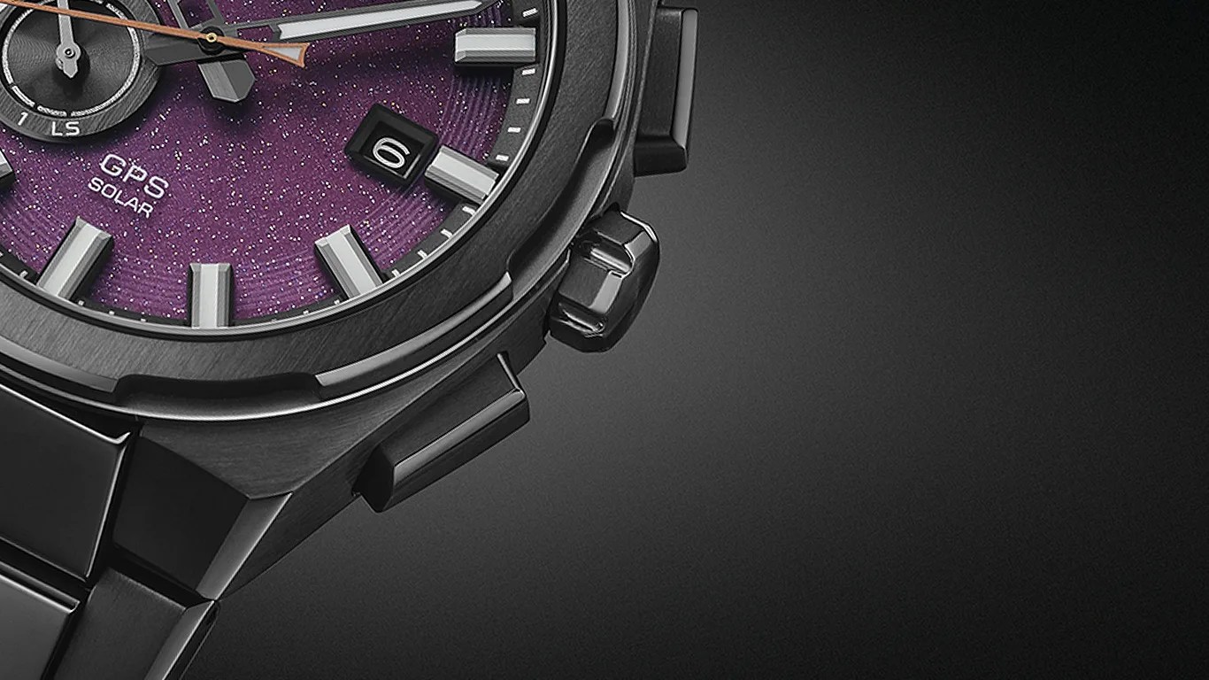 a closeup of a purple and black seiko watch