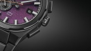 a closeup of a purple and black seiko watch