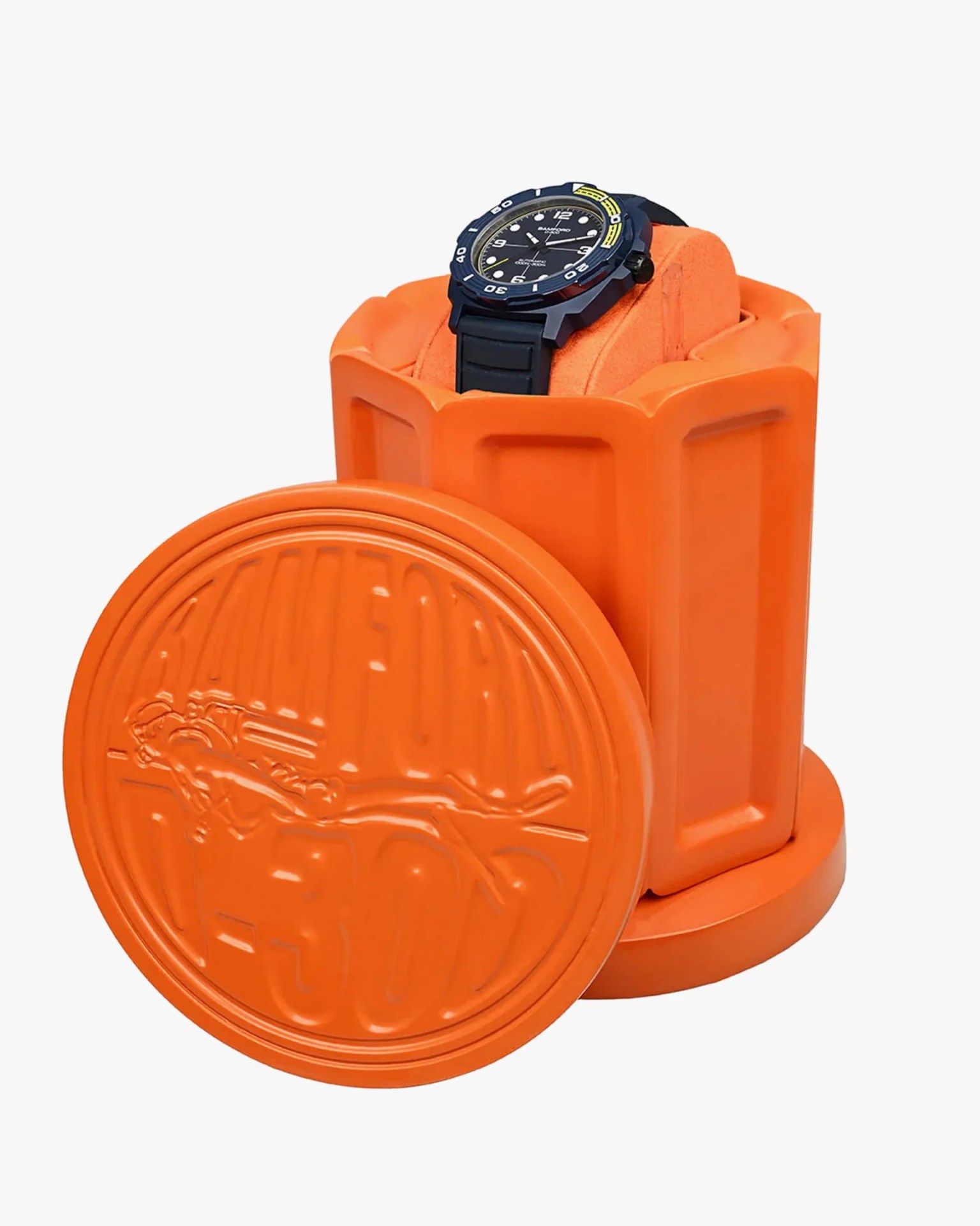 a dive watch in a decorative orange case