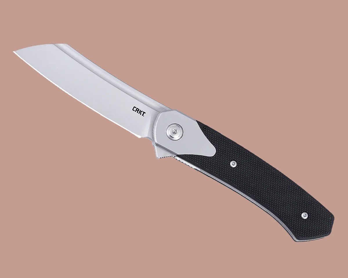 CRKT Viento knife on pink background