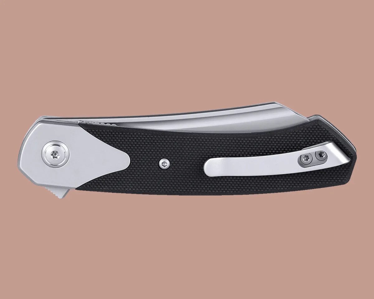 CRKT Viento knife closed on pink background