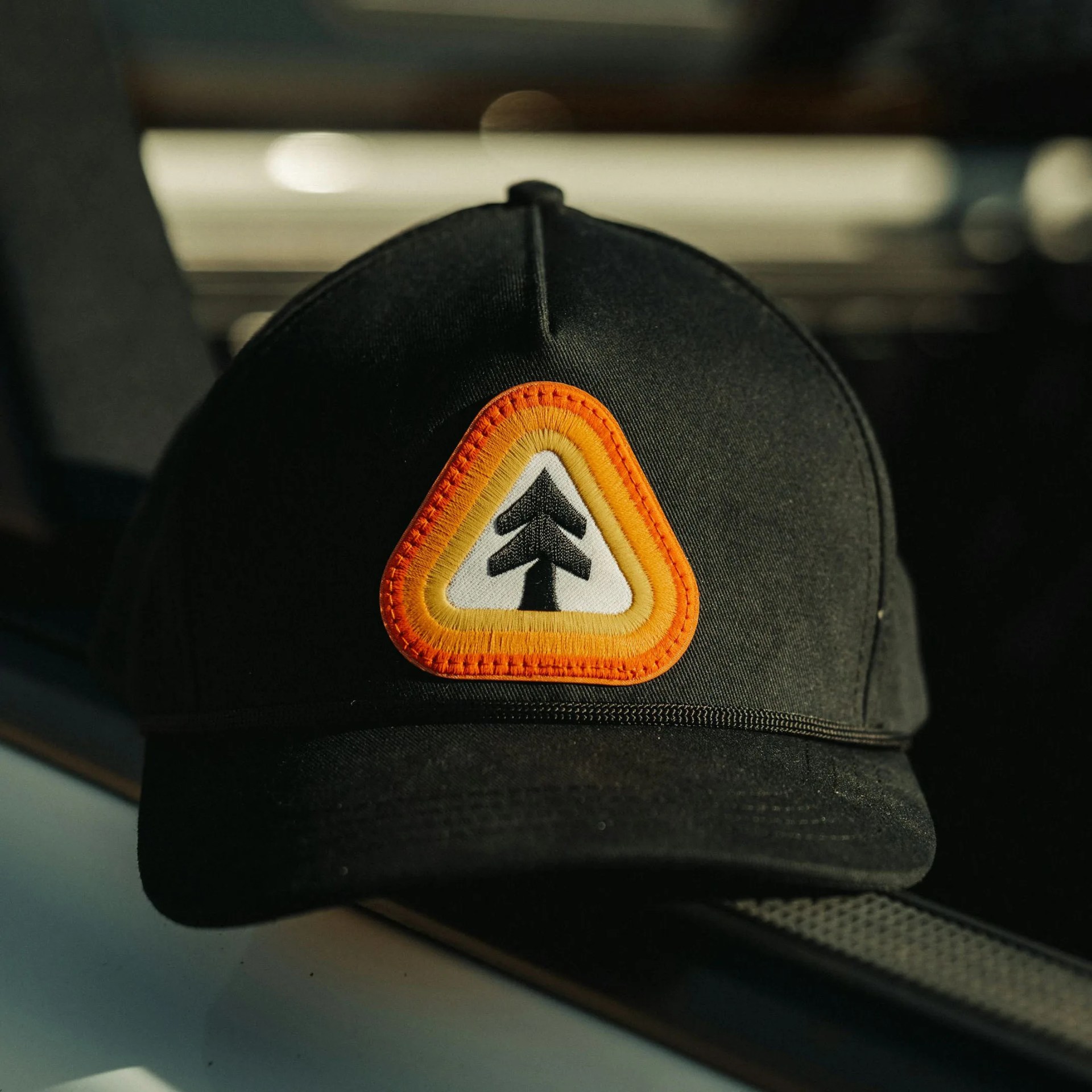 a black huckberry hat sitting on a truck