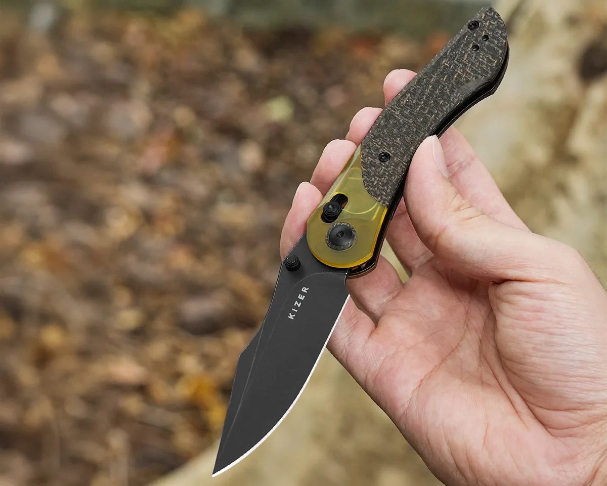 Kizer Mini Mystic knife in hand outdoors