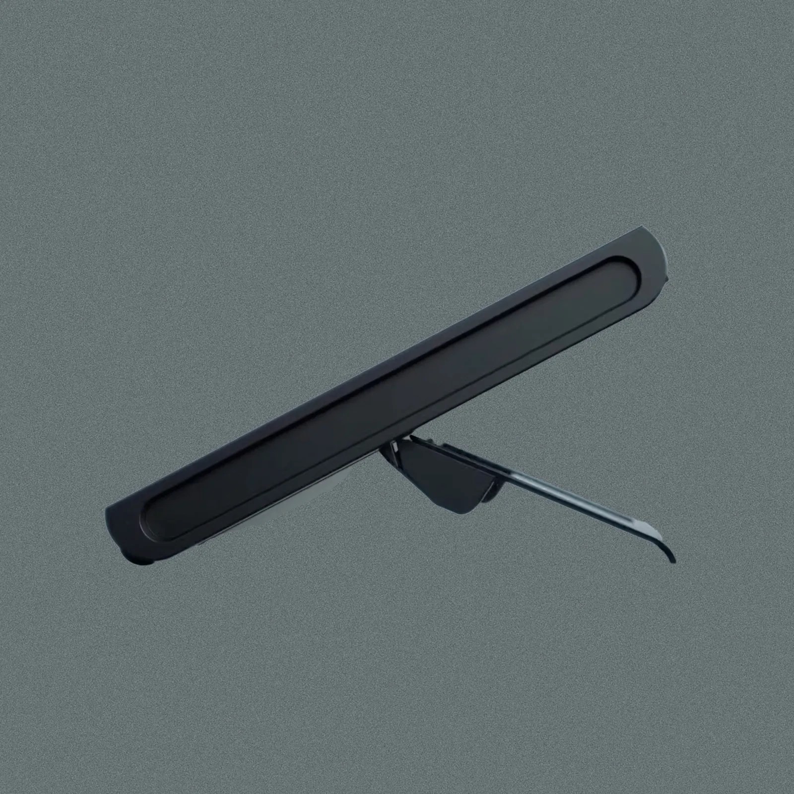 The Nintendo Switch 2 kickstand shown in profile with the tablet bent relatively flat against a dark grey background. 