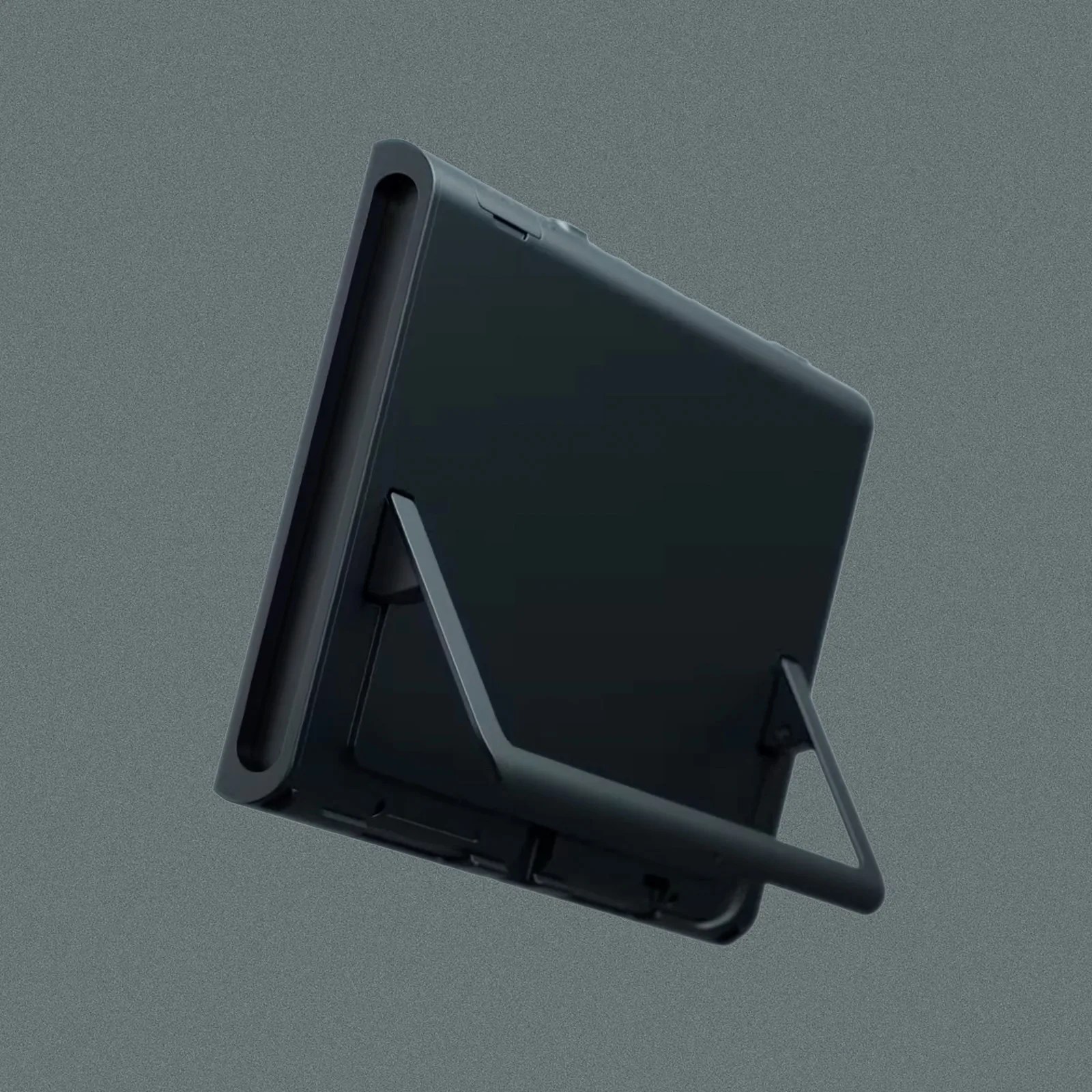 The back of the Nintendo Switch 2 showing the large new, u-shaped kickstand flexed out. 