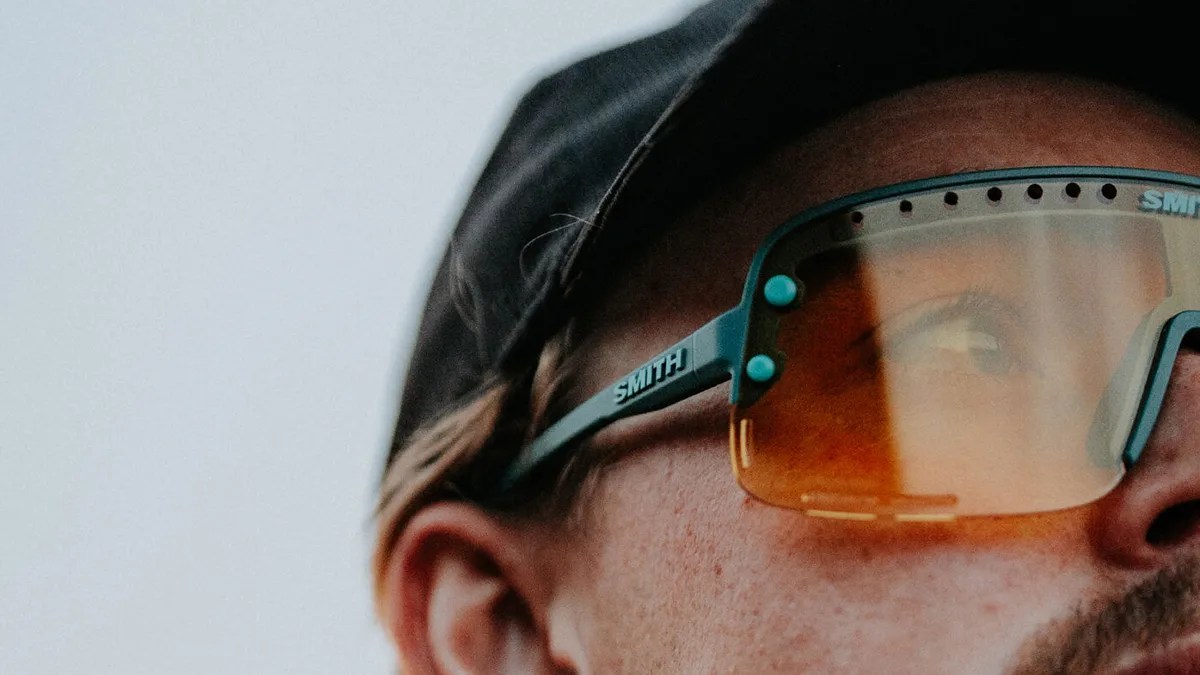 Closeup of Mustached man in Smith hat wearing Smith Ultralight sunglasses