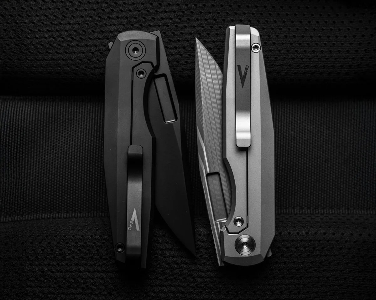 Two Vero Engineering 3.3 knives on a black EDC bag closeup