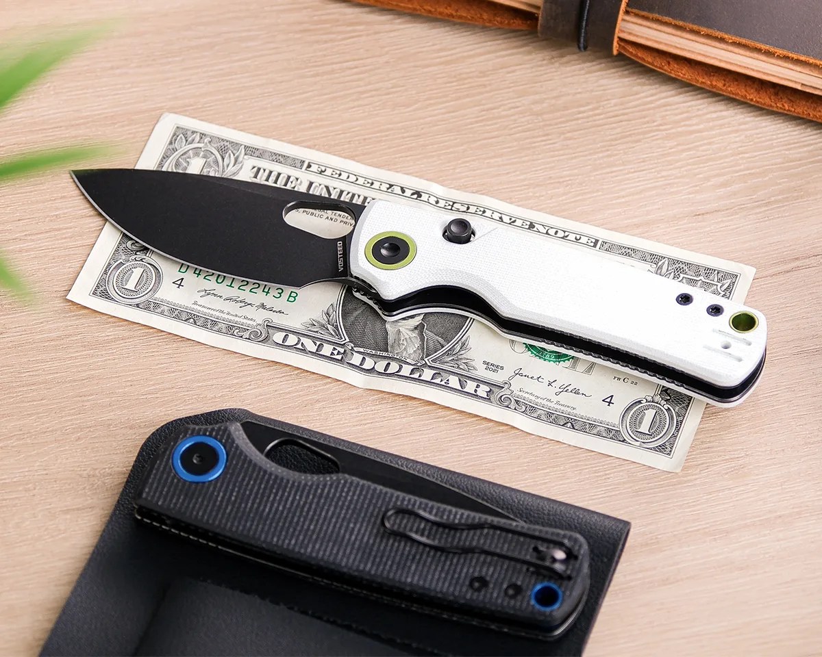 Vosteed Porcupine knife on dollar bill on a wood table