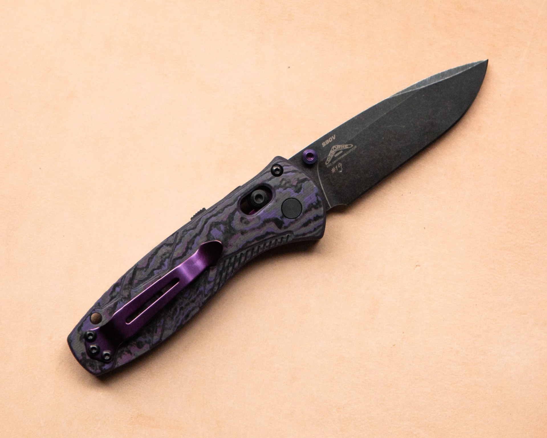 benchmade-mini-barrage-gold-2025-gear-patrol-3