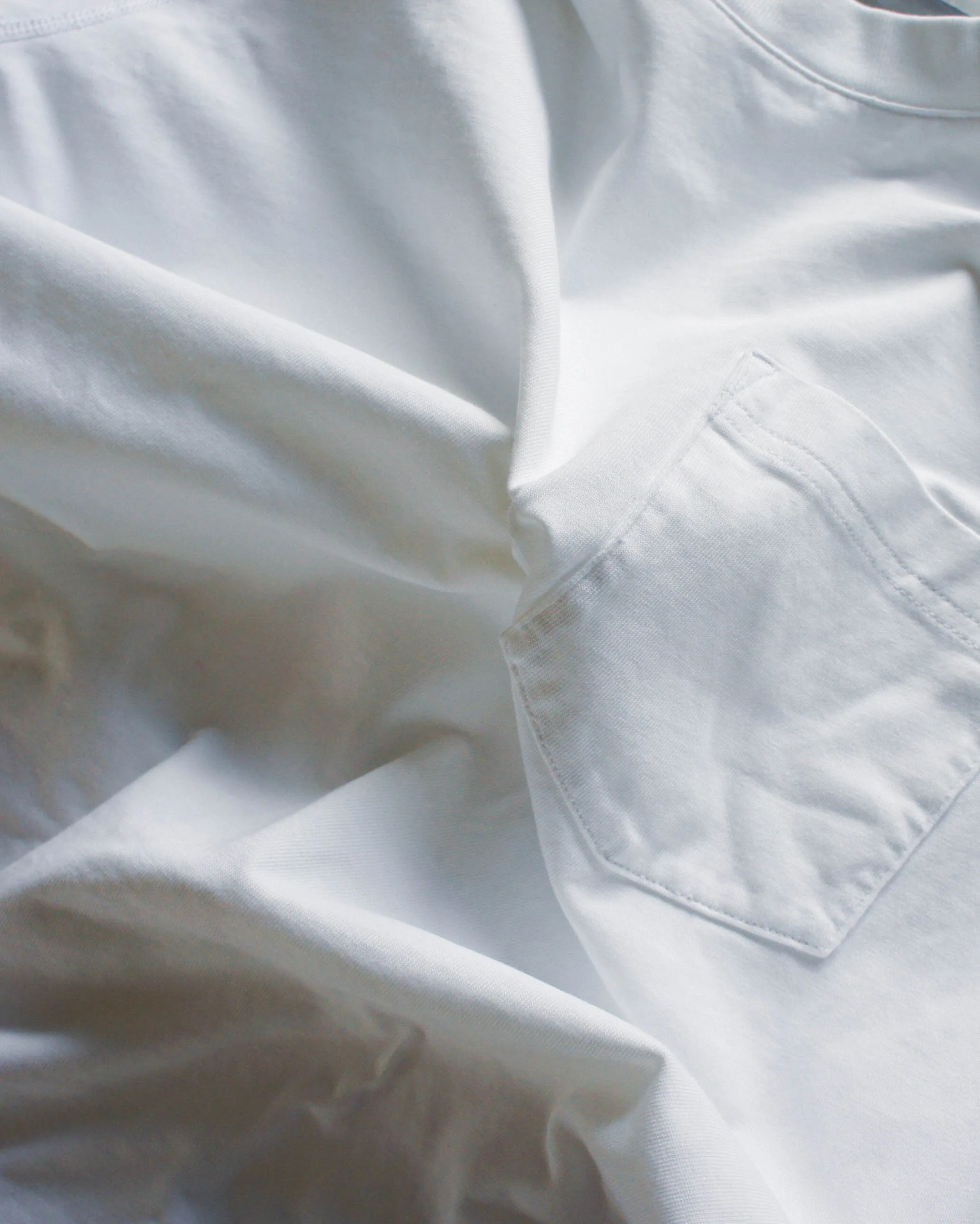 a wrinkled up white t-shirt