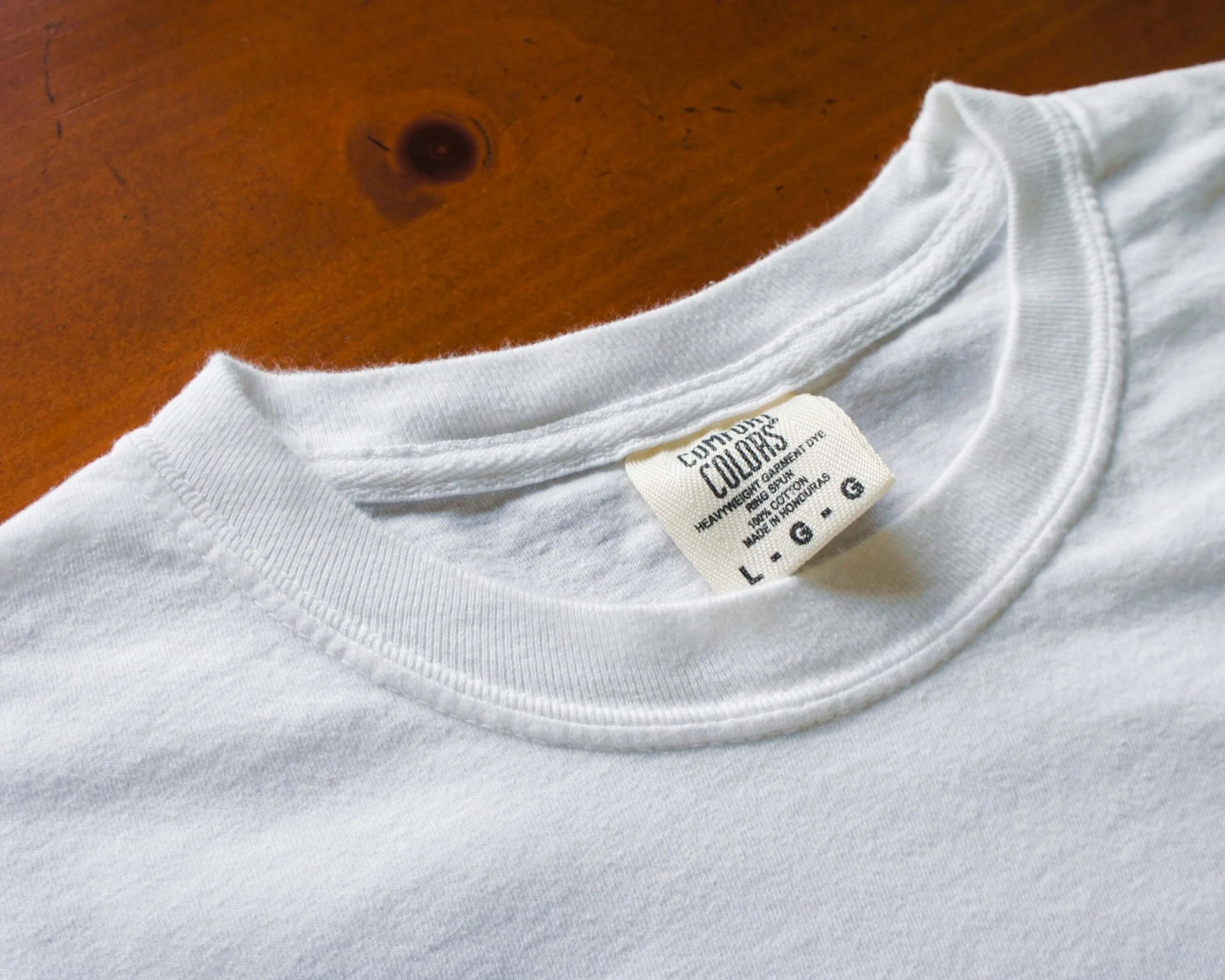 close up of the collar on a white t-shirt