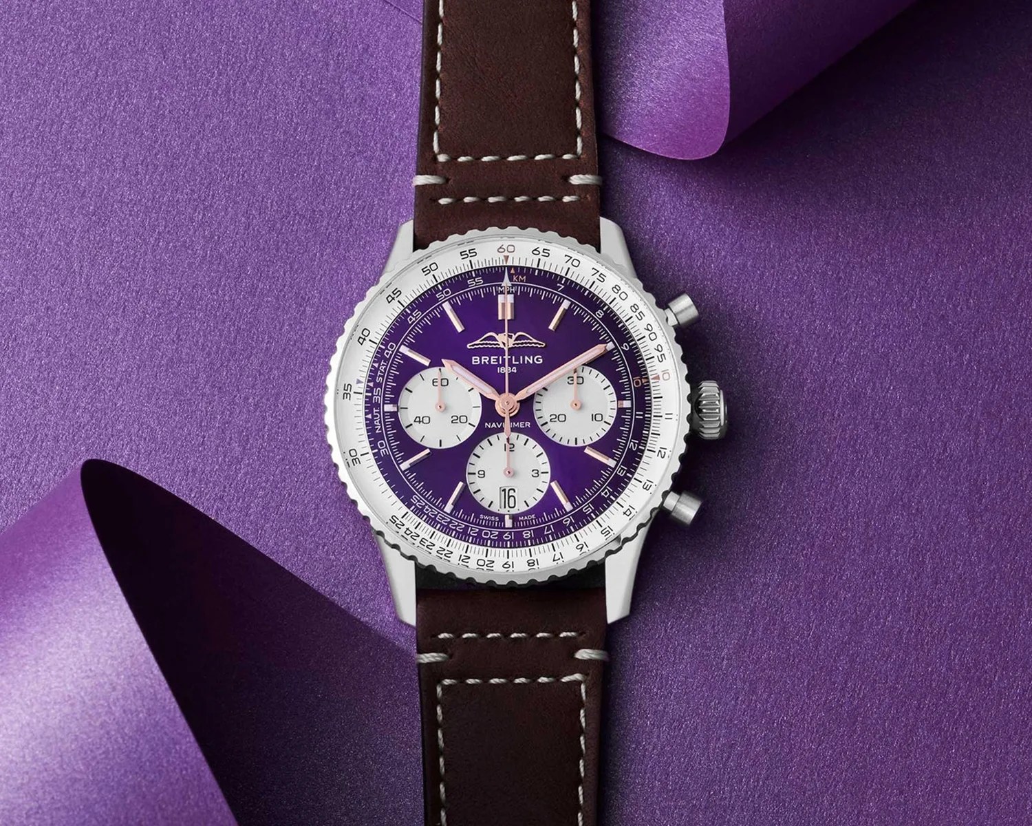 a purple breitling navitimer chronograph