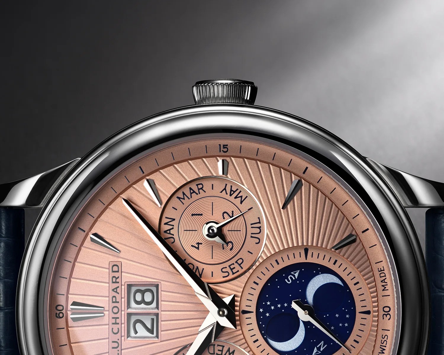a closeup of a chopard dress watch dial
