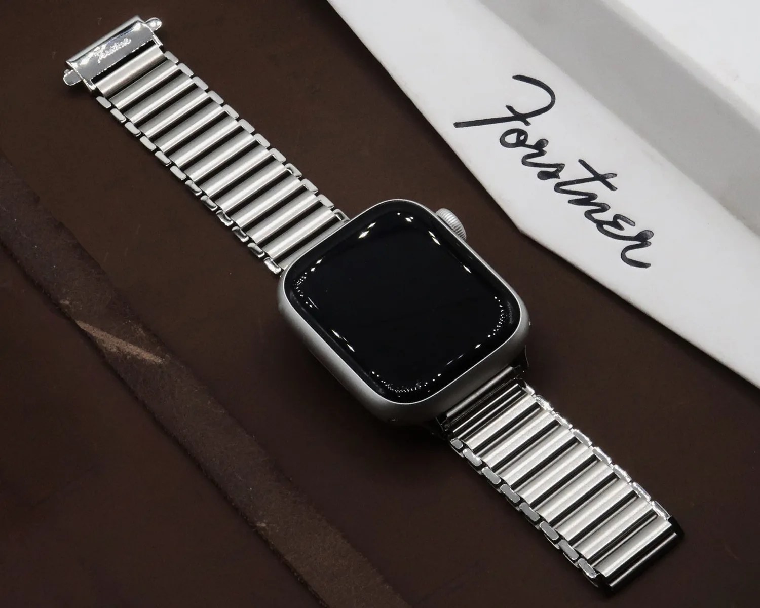 an apple watch on a forstner bracelet