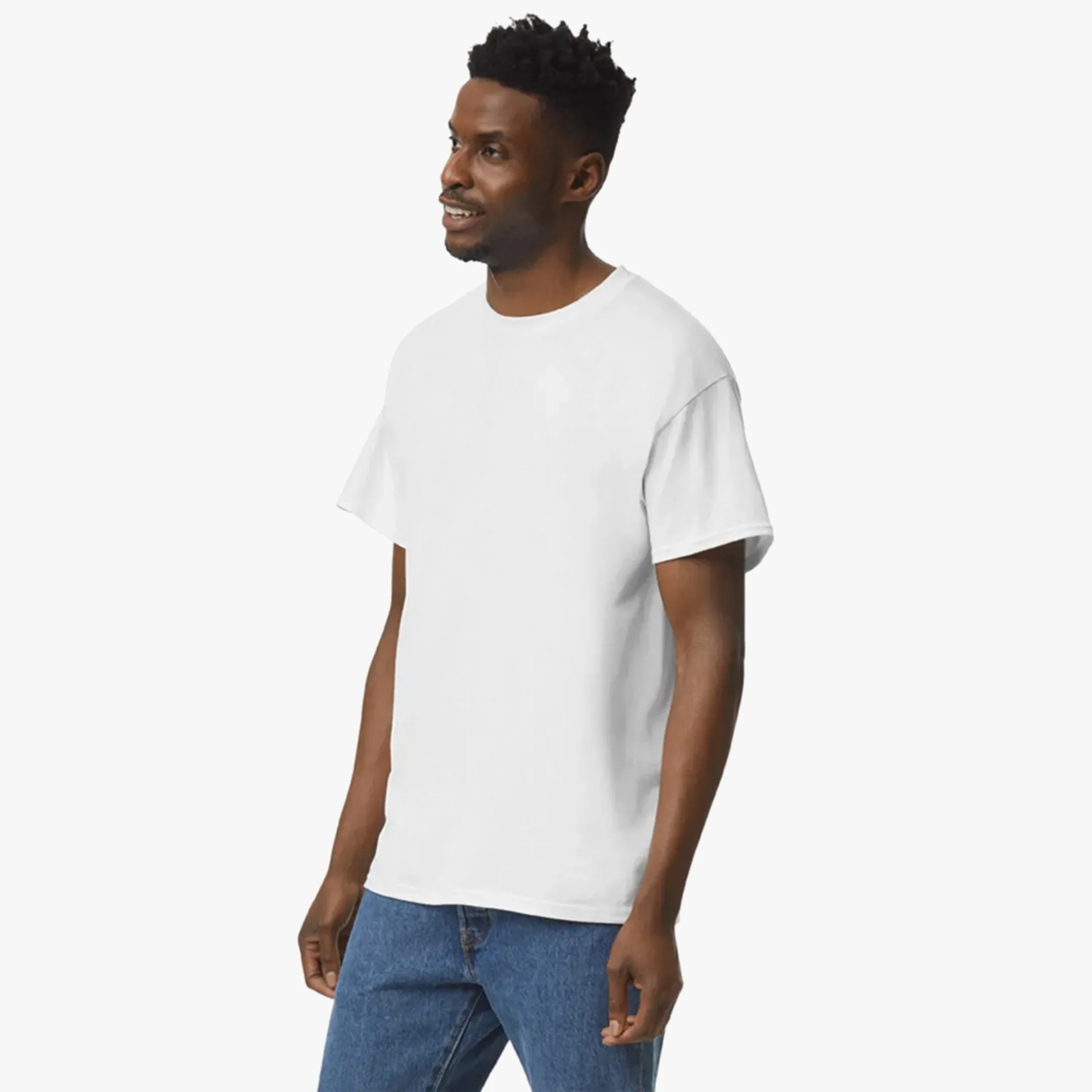 A man in a white t-shirt and blue jeans