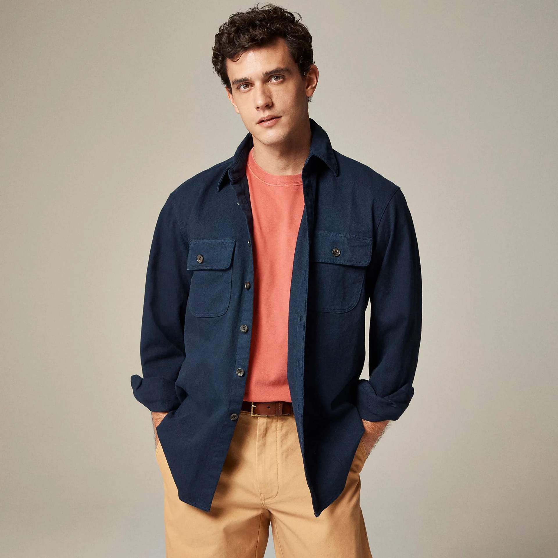 a man in a blue j crew twill shirt