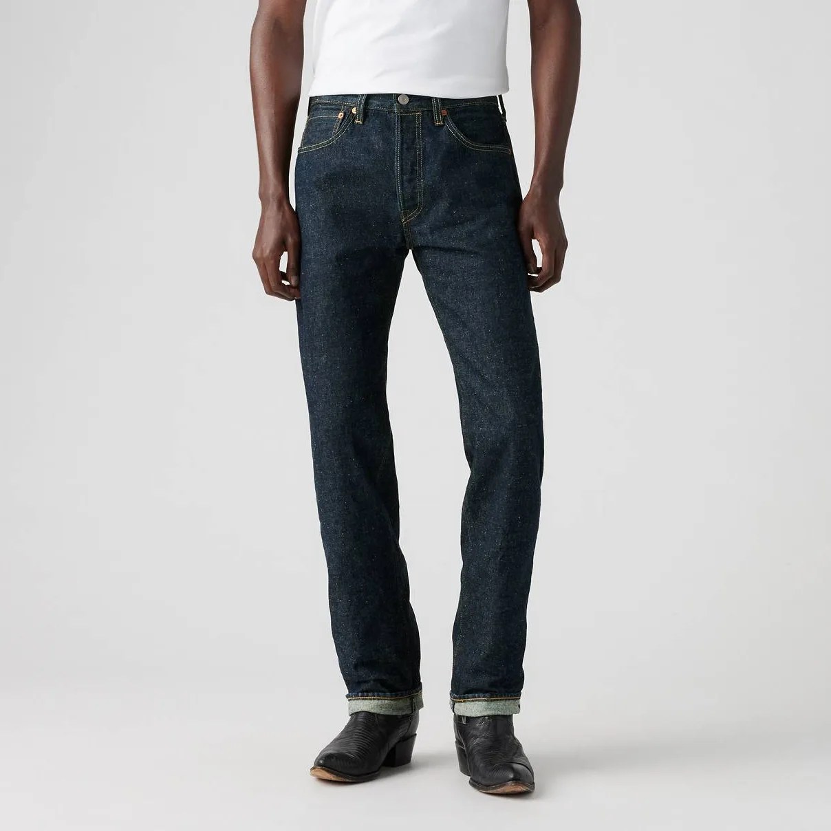 A man in jeans from the waist down.