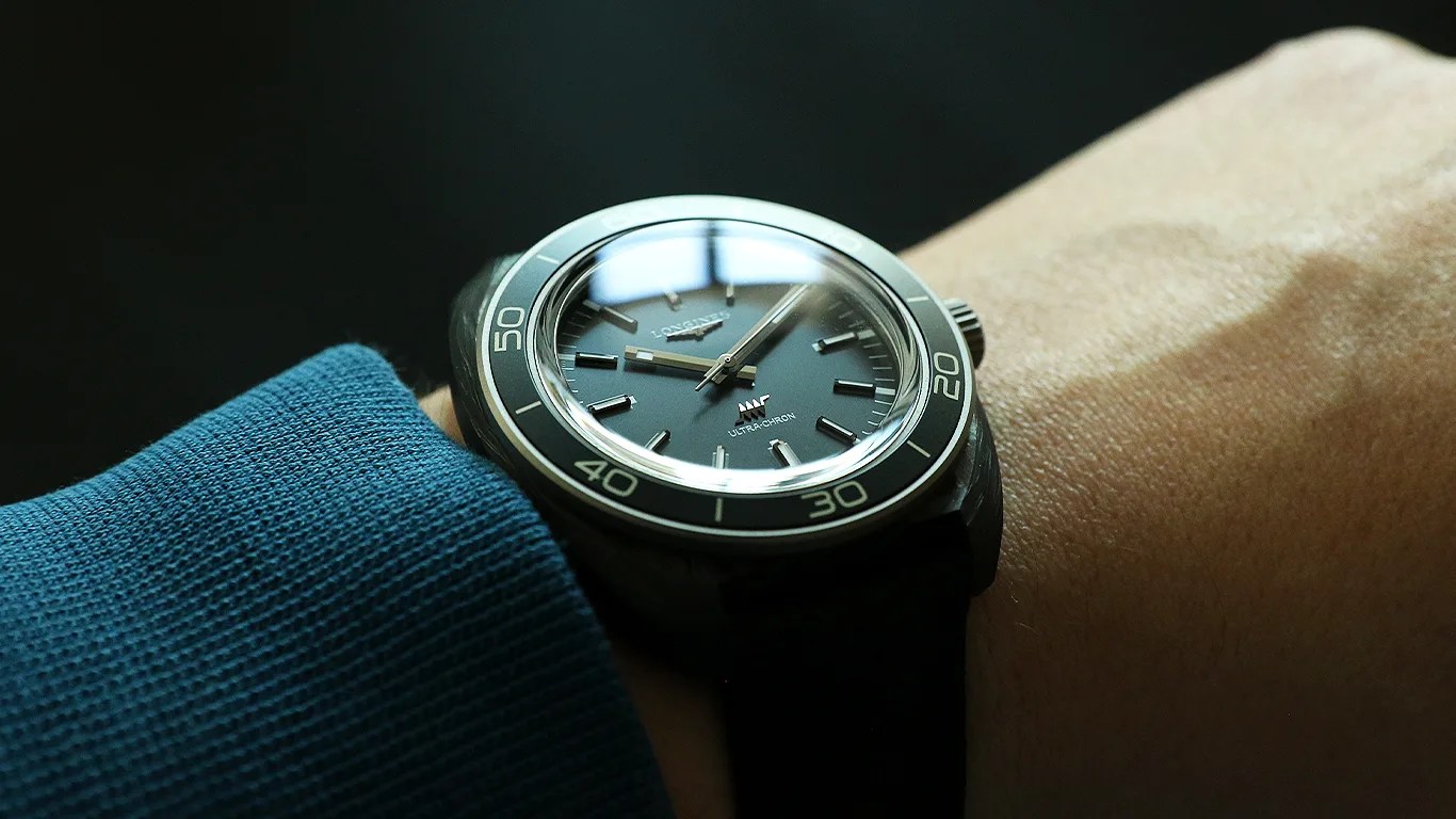 a longines tool watch on a mans wrist