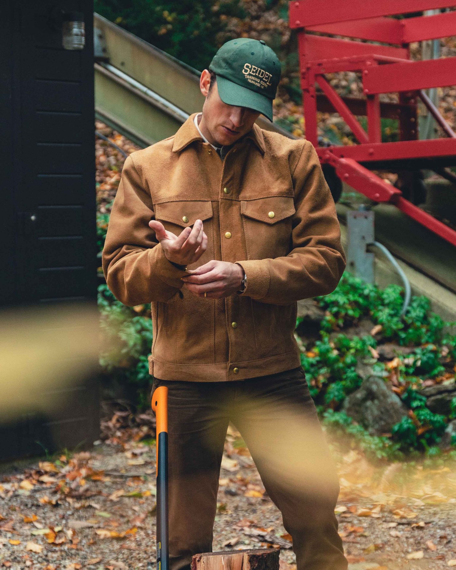man wearing a brown leather jacket