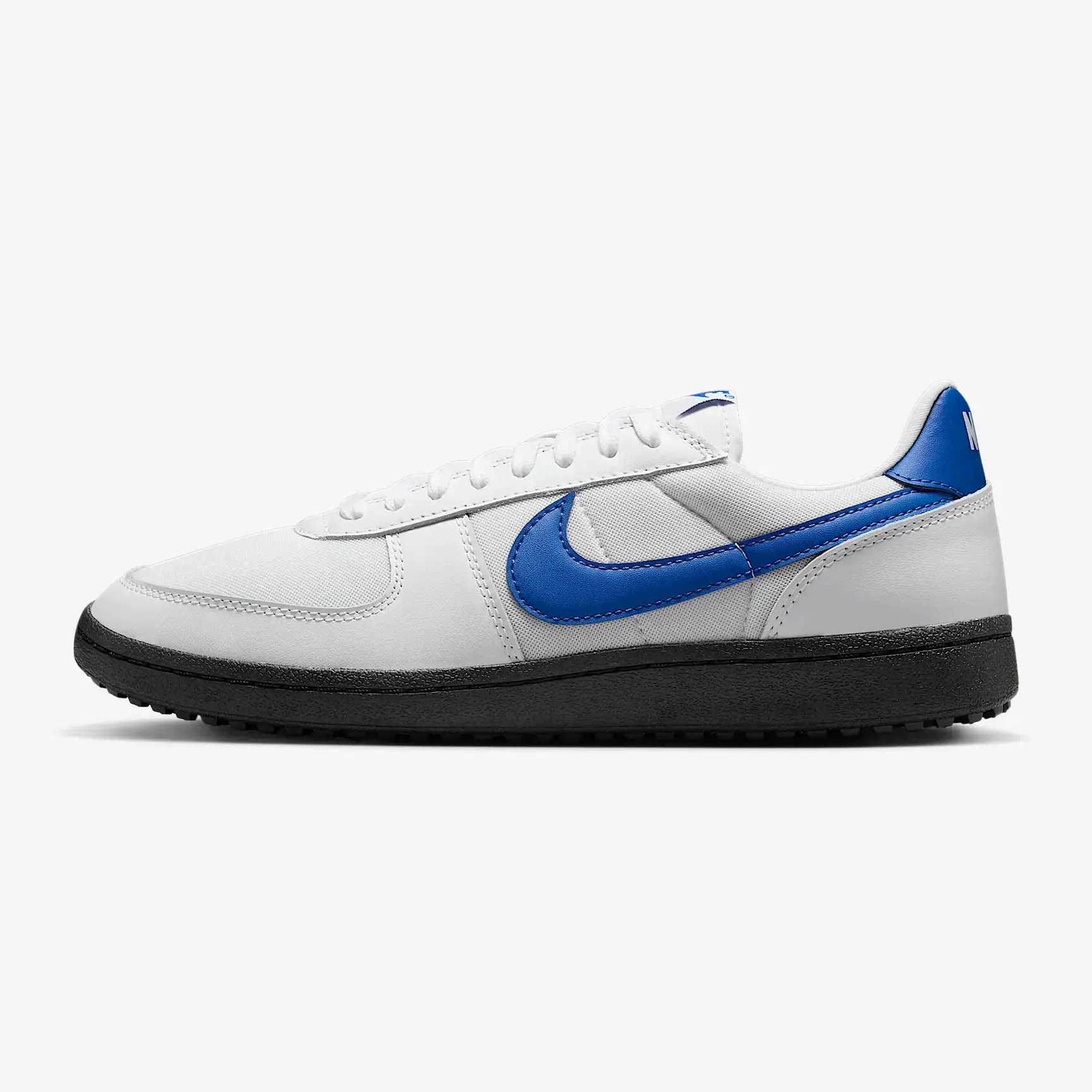 white and blue nike sneaker
