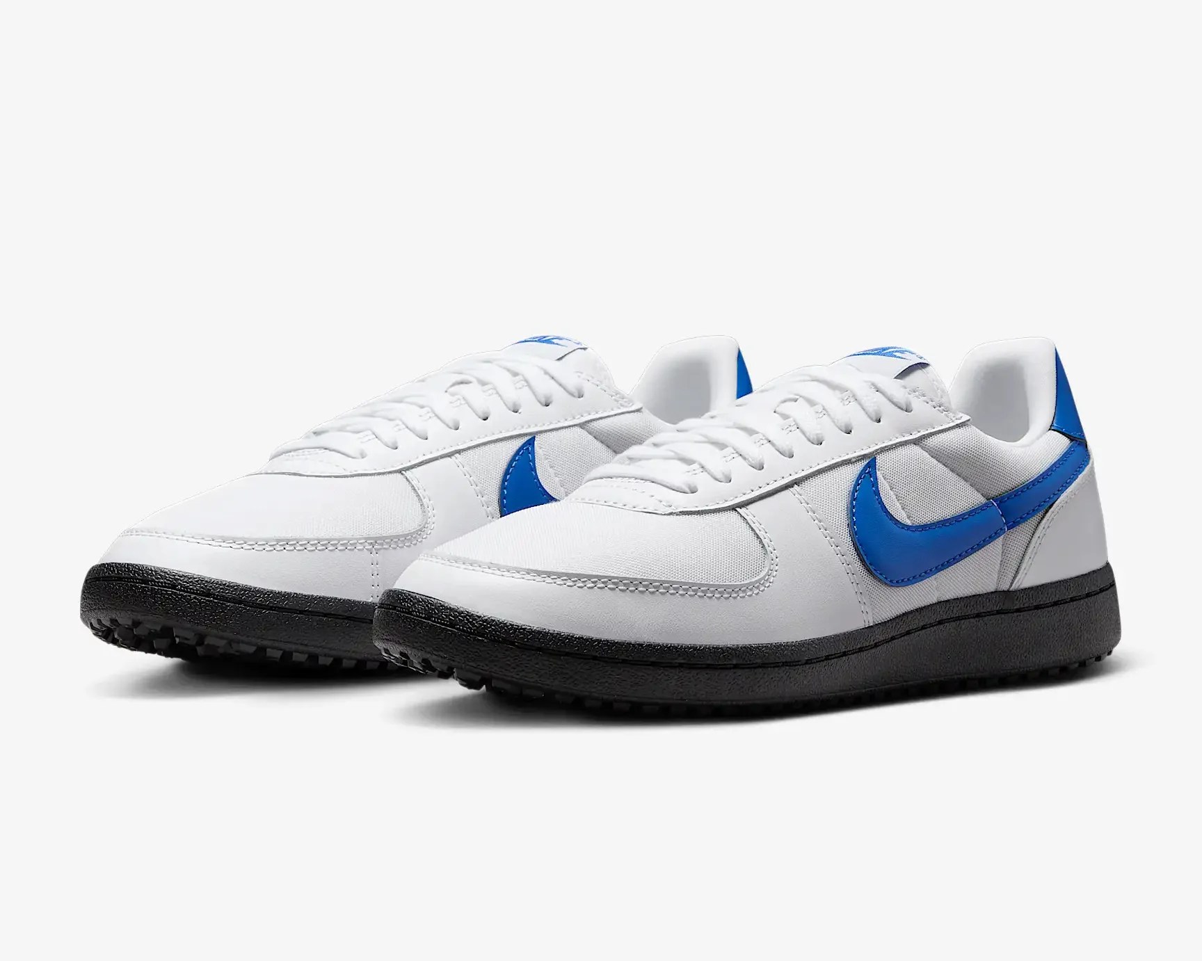 white and blue nike sneaker