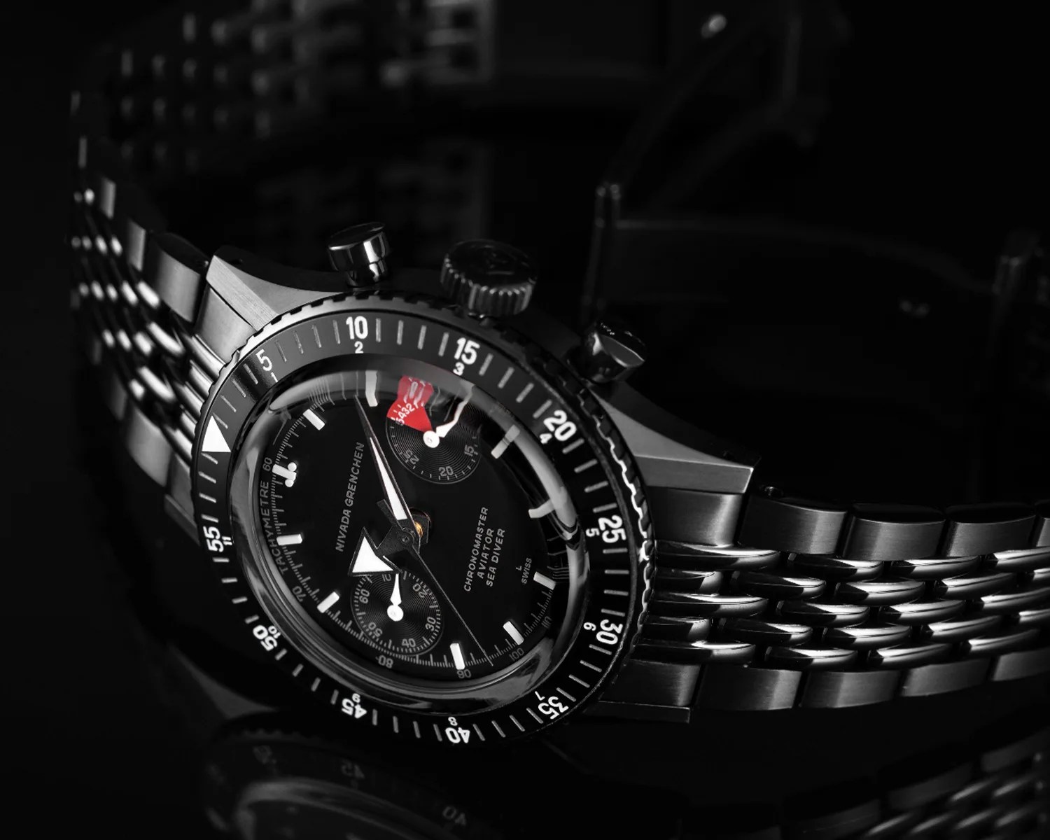 a black nivada grenchen watch
